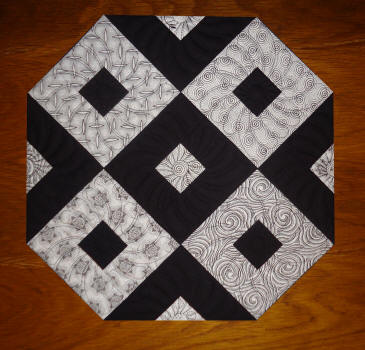 snowball placemat quilt in the hoop