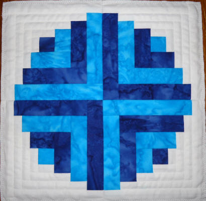 blue curved log cabin squares
